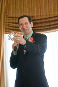 Gordan Douglas on stage during a comedy set.